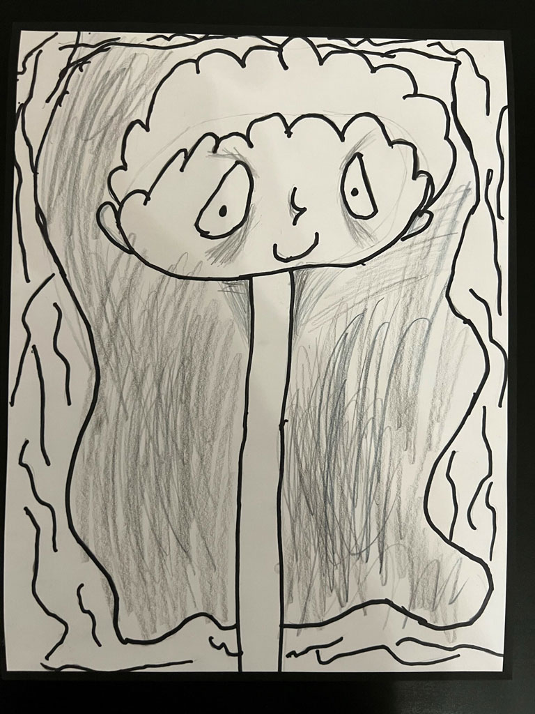 A black and white self portrait of an adolescent boy.